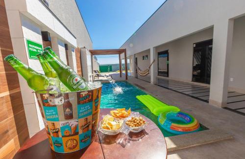 Setor Lagoa Quente House | Sua Casa Perfeita c/4 Suítes e Piscina Aquecida