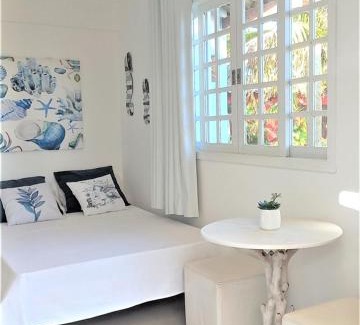 Praia Rasa Apartment | SUITE DA FRENTE COM COPA, WIFI E ACESSO INDEPENDENTE