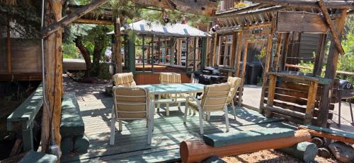 Cedaredge Cabin | Suite with a King Bed and Full Kitchen at the Cedaredge Lodge