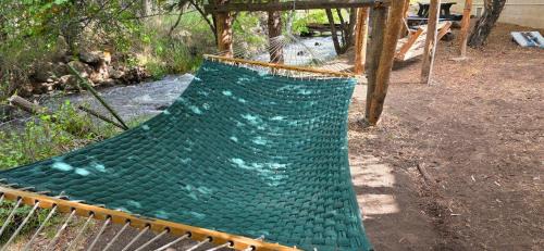 Cedaredge Cabin | Suite with a King Bed and Full Kitchen at the Cedaredge Lodge