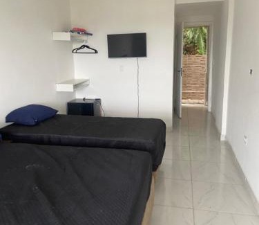 Jardim Praiano House | Suites mirante da Enseada