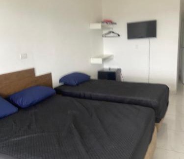 Jardim Praiano House | Suites mirante da Enseada