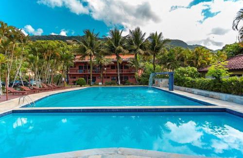 Maresias House | SUN Flat Maresias ! 2 Quartos Piscina Churrasqueira WiFi Estacionamento 230m da Praia