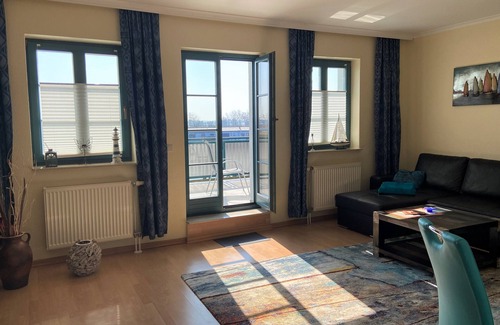 Karlshagen Apartment | Sunny apartment with large balcony overlooking the marina
