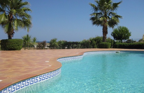 Albardeira Apartment | SUNNY GRD FLR APT SEA VIEW+POOL+WALK TO BEACH MARINA&TOWN+GREAT WIFI&FREEVIEW TV