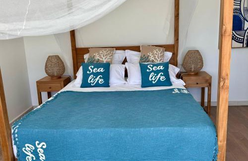 Malendure Villa | Sunset Beach - Villa Créole 5 étoiles 4 Chambres avec piscine face au coucher de soleil et à la réserve Cousteau