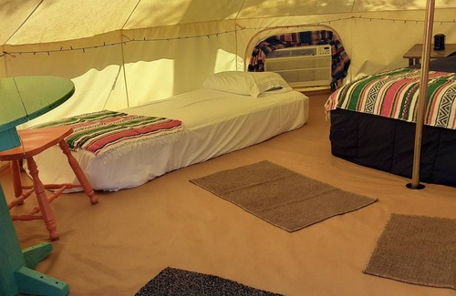 Spring Branch RV Rental | Sunset Ridge Glamp Tent Queen Bed, 2 cots, AC and Electric