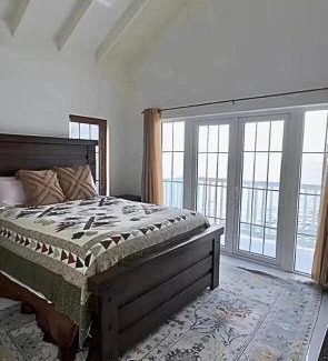 Orange Bay House | Sunset Serenity 2BR Oceanview Beach & Pool Access