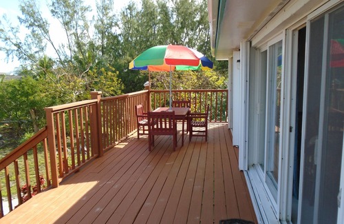 Great Exuma Apartment | SUPER BEACHFRONT- directly on HOOPERS BAY: large 4 bed 4 Bath APT for 8