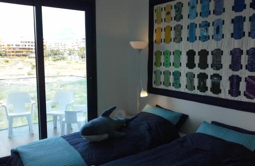 Punta Prima Apartment | Super zeezicht in eerste lijn met verwarmd zwembad en fitness
