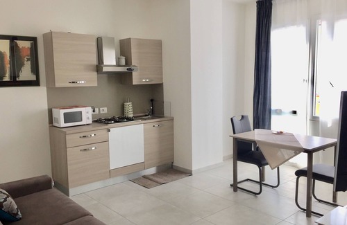 San Bonifacio Condo | Superior apartment with bedroom, bathroom, kitchenette and living room