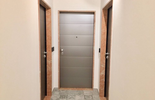 San Bonifacio Condo | Superior apartment with bedroom, bathroom, kitchenette and living room