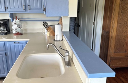 Suttons Bay Cottage | Suttons Bay, in town and steps away from beach - trail, wineries and shopping