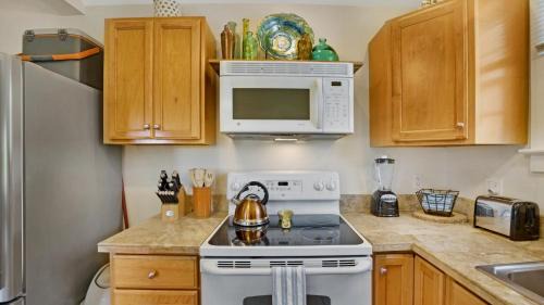Uptown - Upper Duval Apartment | Suzys Parrot Perch by Last Key Realty