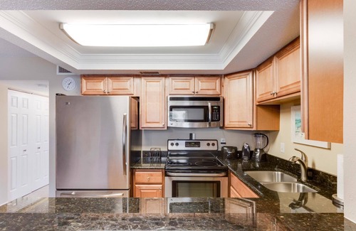 Treasure Island Condo | Swaying Palm Trees; Warm Gulf Breeze