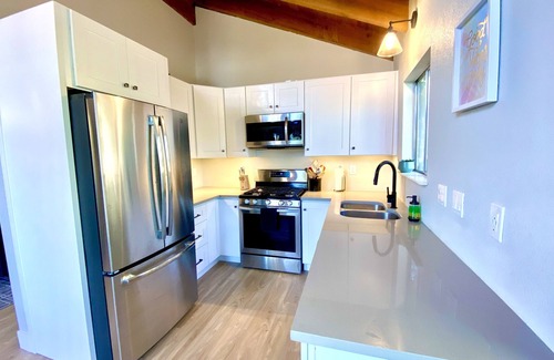 Tahoe Village Condo | Tahoe Mountain Condo with Tree Filtered Lake Views.