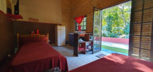 Prumirim House | Tahoma Chale Rustico côr Café e vermelho Prumirim Paraiso