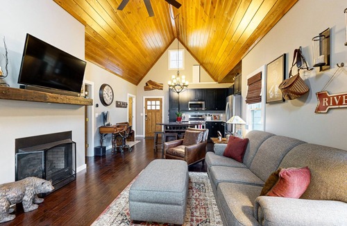 Cullowhee House | Take in the natural beauty from this elegant riverfront home