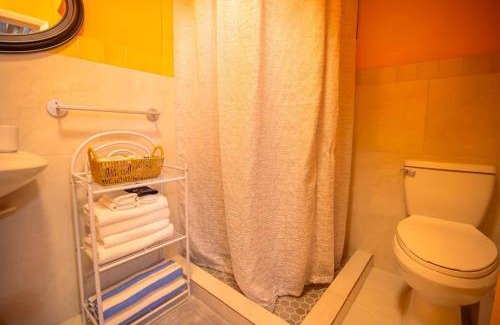 Coral Harbour House | Tangerine Sunsets Mango