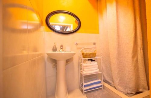 Coral Harbour House | Tangerine Sunsets Mango