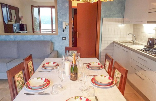 Lezzeno Apartment | Tastefully furnished 2-room apartment in direct sea location with pool and private beach