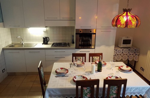 Lezzeno Apartment | Tastefully furnished 2-room apartment in direct sea location with pool and private beach