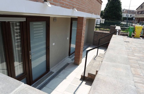 Santa Maria Maddalena Apartment | Terraces two-room studios with patio and parking in front