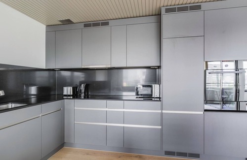 Seebach Apartment | Terrific Oerlikon 1BR w/Balcony, W/D & Elevator, by Blueground