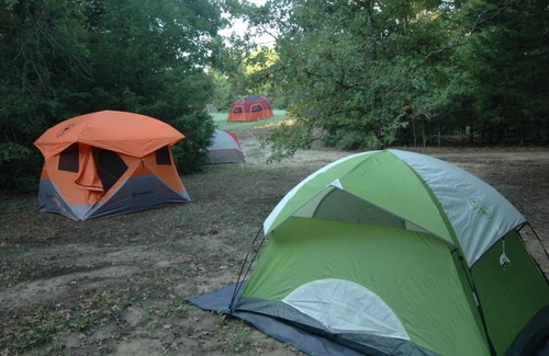 Elmo RV Rental | Texas Safari Camp-Tent & Tree House Retreat