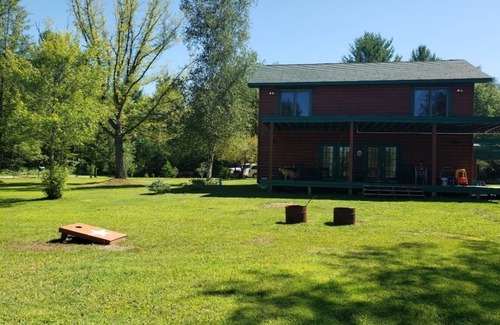 Arenac County House | tGorgeous 4BR Log Retreat on 40 Acres —Pond View – Mid-Michigan—sleeps 11+