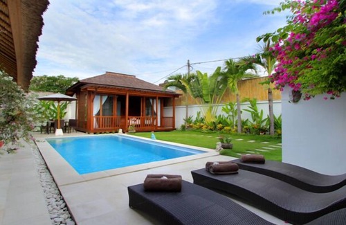 Sunset Road Villa | Thatched Tropical Garden Home with Pool in Trendy Seminyak