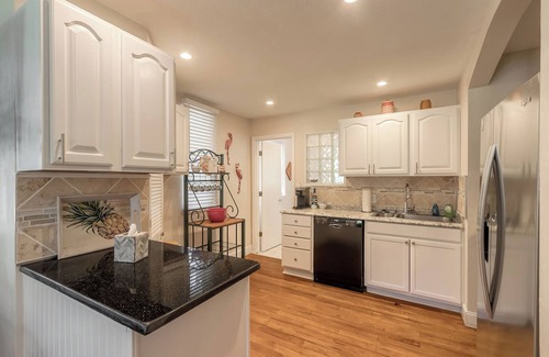 Elizabeth Mcbrides Raulersons House | The Adorable Blue Bungalow- Pet Friendly with a fully fenced in back yard.