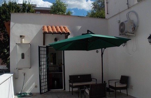 San Giovanni Apartment | The attic of Val. Apartment with large terrace, in a period cottage.