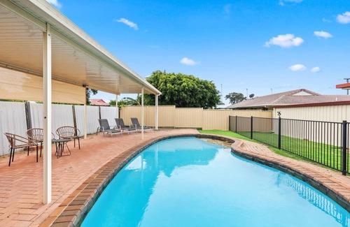Urangan House | The Aussie Classic Poolside Living by the Marina