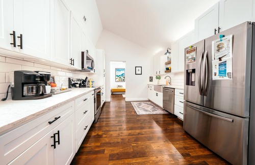 Bentonville House | The Blue Door Bentonville is an ideal Bike In/Bike Out location, close to dwtwn.