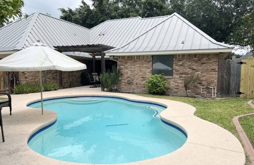 McAllen House | The Book and Bed Pool House!
