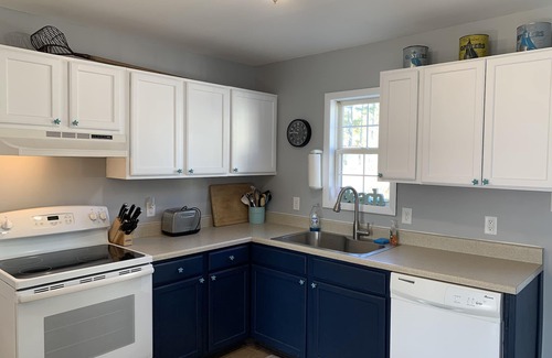 Chincoteague House | The Brass Crab - Check in/out any day!