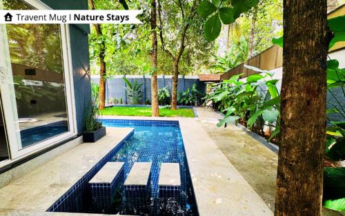 Ramanagara Villa | The Calms Villa by Travent Mug