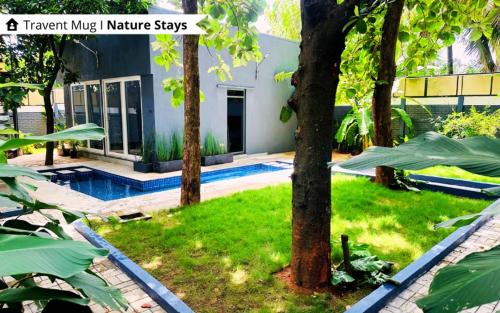 Ramanagara Villa | The Calms Villa by Travent Mug