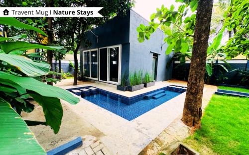 Ramanagara Villa | The Calms Villa by Travent Mug