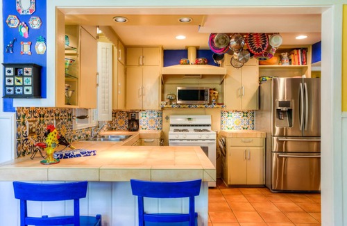 Allandale House | The CHA CHA CHA is a colorfully decorated home in a desirable neighborhood.