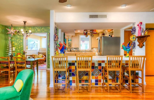 Allandale House | The CHA CHA CHA is a colorfully decorated home in a desirable neighborhood.