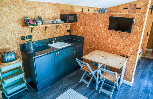 Carlisle Cabin | The Chard with hot tub overlooks a wildlife pond sleeping 2