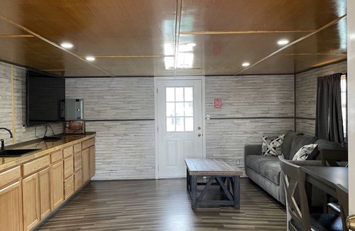 Big Creek House | The Floating Log - Log Cabin inspired Floating Home