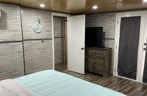 Big Creek House | The Floating Log - Log Cabin inspired Floating Home