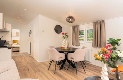 Municipality of Apeldoorn House | The Forest Lodge is a contemporary and surprisingly spacious chalet.