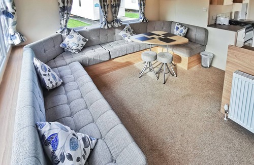Aberystwyth House | The Gold Plus 2 caravan (pet) is 12ft wide with one double and one twin.