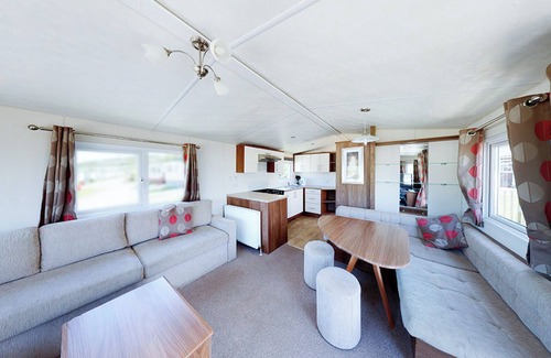 Aberystwyth House | The Gold Plus 2 caravan (pet) is 12ft wide with one double and one twin.