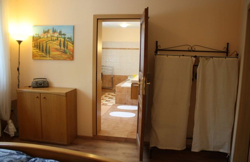 Schwerin Apartment | The house on the lake, with small. Beach, bathing area, gr. Sunbathing lawn, playground