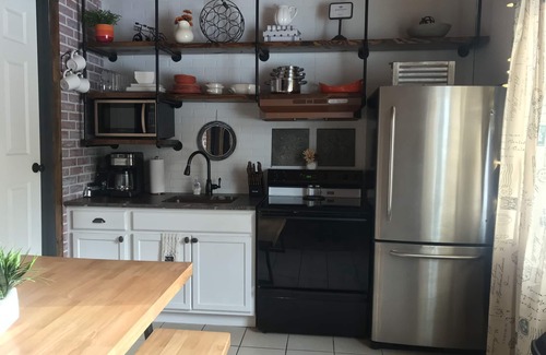 Wellston Cabin | The Industrial Suite 2 Bed 1 Bath Cabin Near Trails and Big Manistee River!